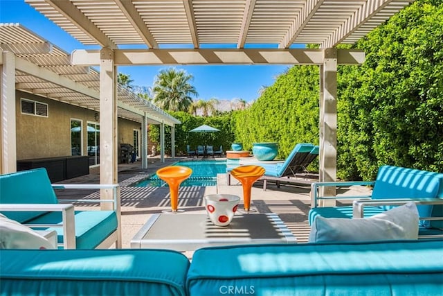 view of pool featuring outdoor lounge area, a patio, and a pergola