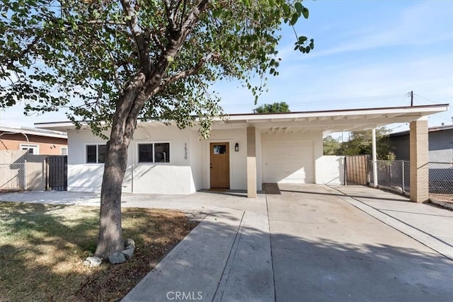 single story home featuring a garage