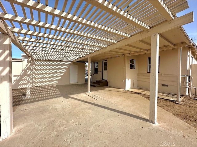 view of patio featuring a pergola