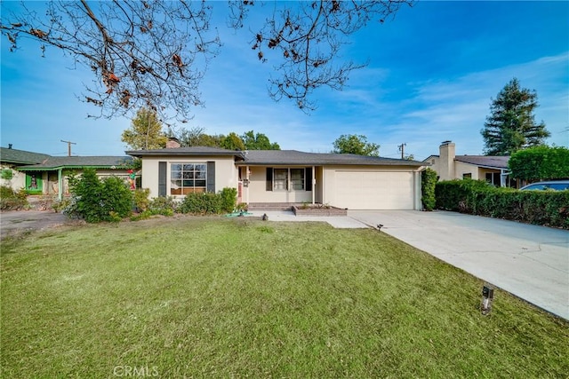 ranch-style home featuring a front lawn and a garage