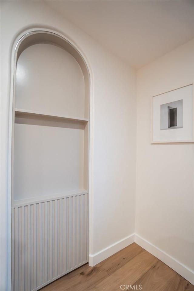 spare room featuring hardwood / wood-style floors