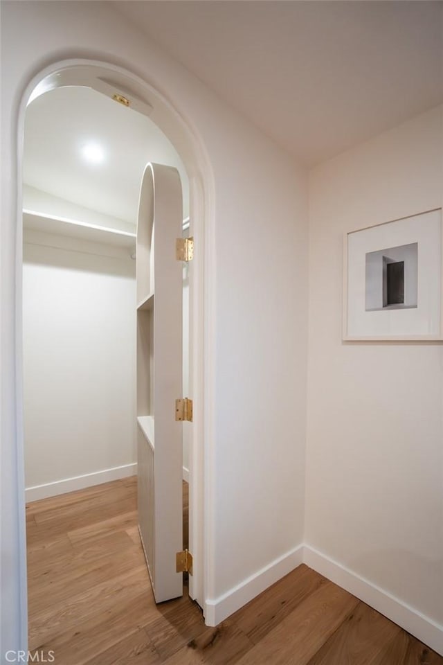 hallway featuring light wood-type flooring