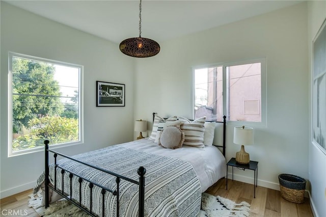 bedroom featuring hardwood / wood-style floors