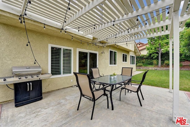 view of patio / terrace featuring a grill and a pergola