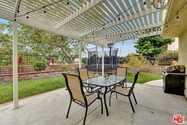 view of patio / terrace featuring a pergola, a grill, and a trampoline