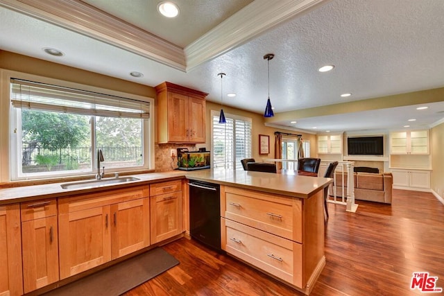 kitchen with pendant lighting, black dishwasher, sink, kitchen peninsula, and crown molding