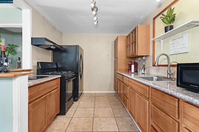 kitchen with black appliances, sink, backsplash, ventilation hood, and light tile patterned floors