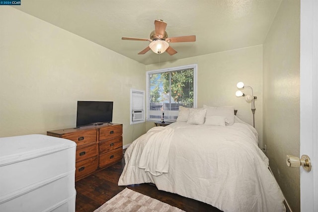 bedroom featuring ceiling fan and dark hardwood / wood-style flooring