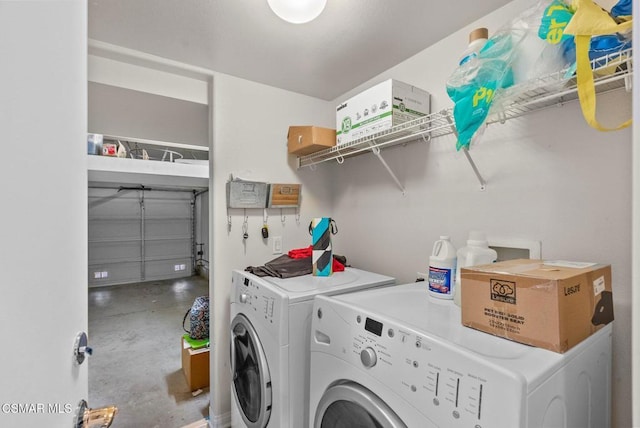 laundry room with separate washer and dryer