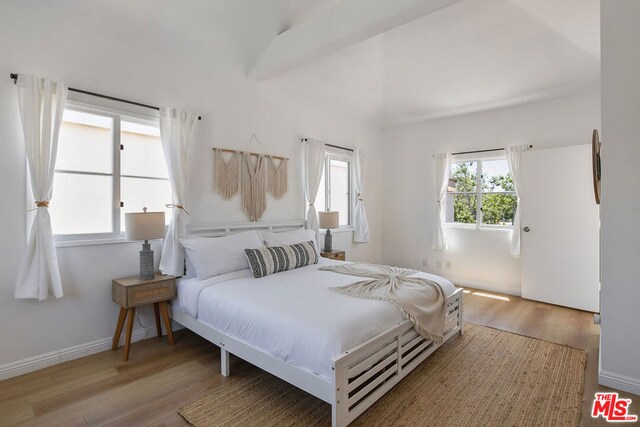 bedroom with light wood-type flooring