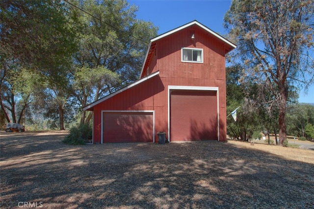 view of outdoor structure featuring a garage