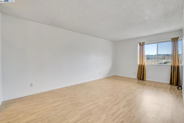 empty room featuring light hardwood / wood-style flooring