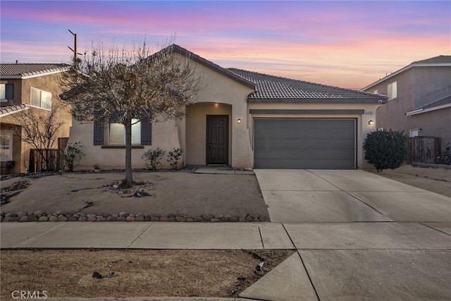 view of front of home featuring a garage