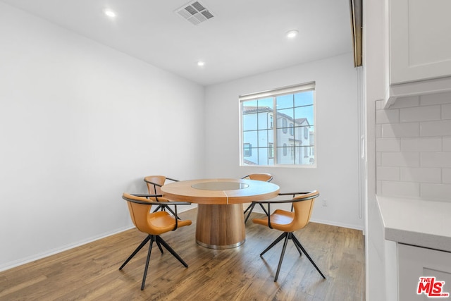 dining room with light hardwood / wood-style flooring