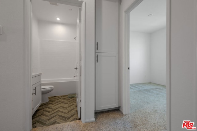 full bathroom featuring toilet, vanity, and shower / tub combination