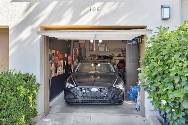 garage featuring a garage door opener