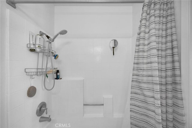 full bathroom with shower / bath combination with curtain