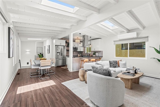 living room with dark hardwood / wood-style floors, an AC wall unit, and lofted ceiling with beams