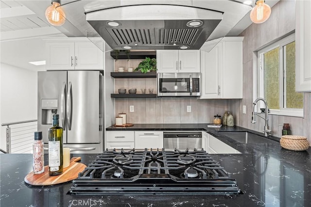 kitchen featuring exhaust hood, stainless steel appliances, white cabinetry, and sink