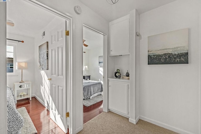 corridor featuring light hardwood / wood-style flooring