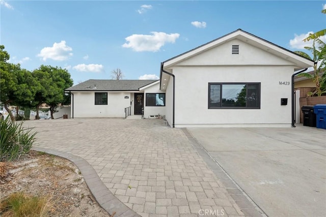 rear view of house featuring a patio area