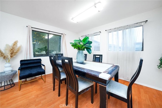 dining area featuring hardwood / wood-style flooring