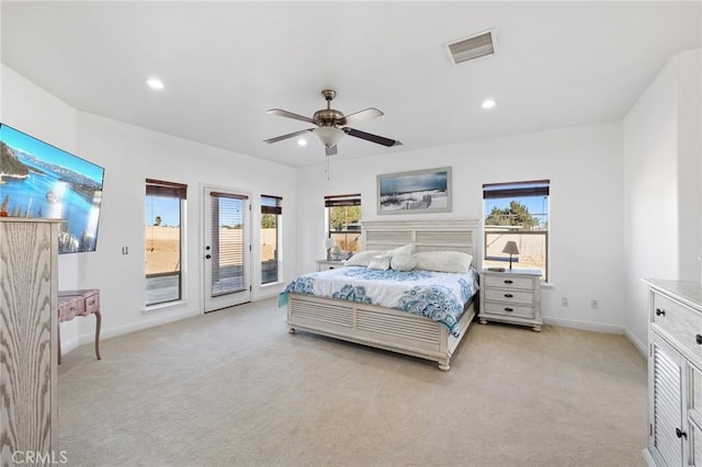 carpeted bedroom featuring ceiling fan and access to outside