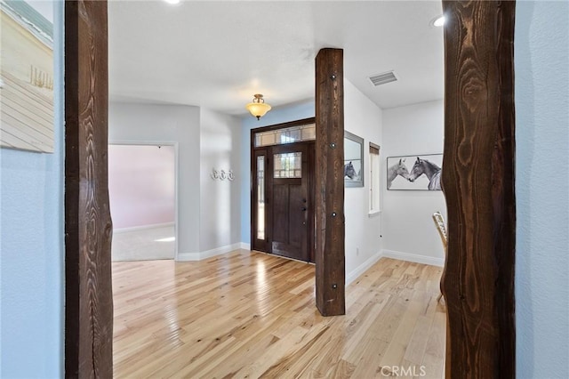 entrance foyer with light hardwood / wood-style floors