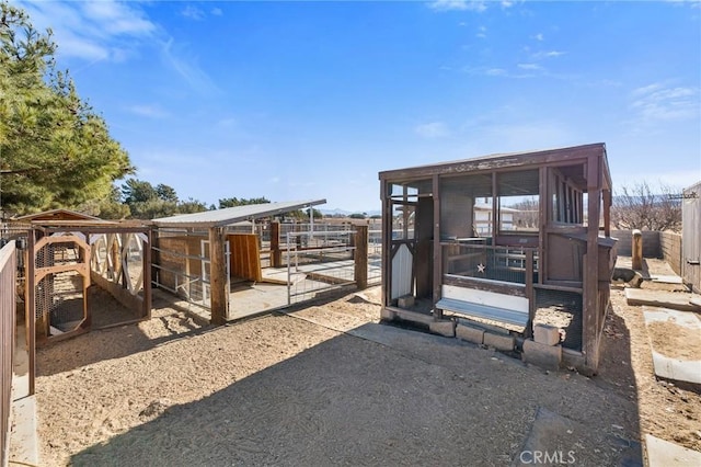 exterior space featuring an outbuilding