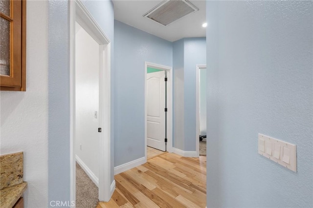 hall featuring light hardwood / wood-style floors