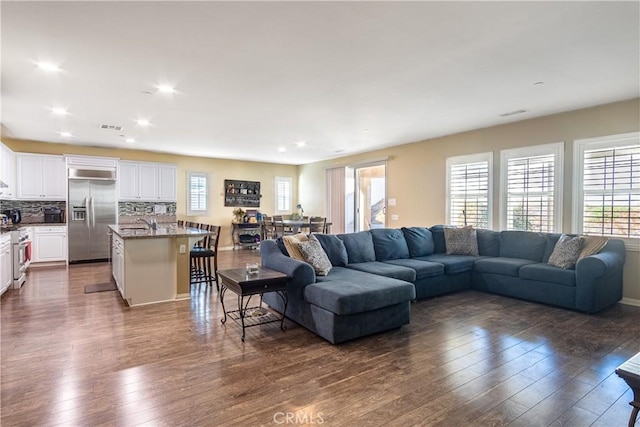 living room with dark wood-type flooring