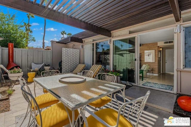 view of patio / terrace featuring a pergola