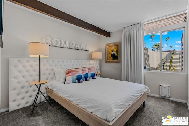 bedroom featuring beamed ceiling and dark colored carpet