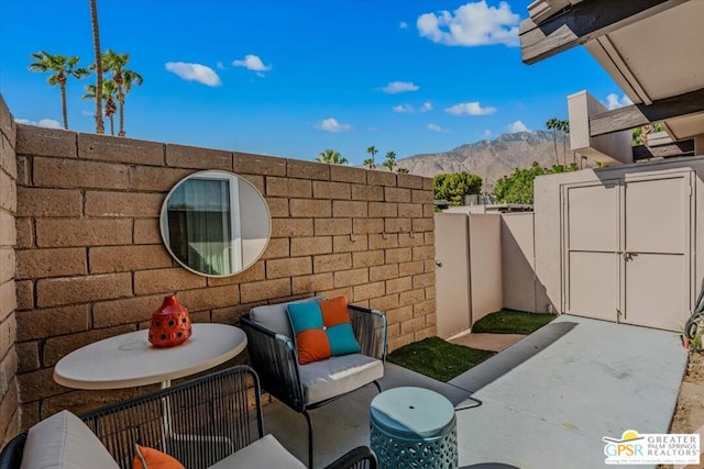 view of patio featuring a mountain view