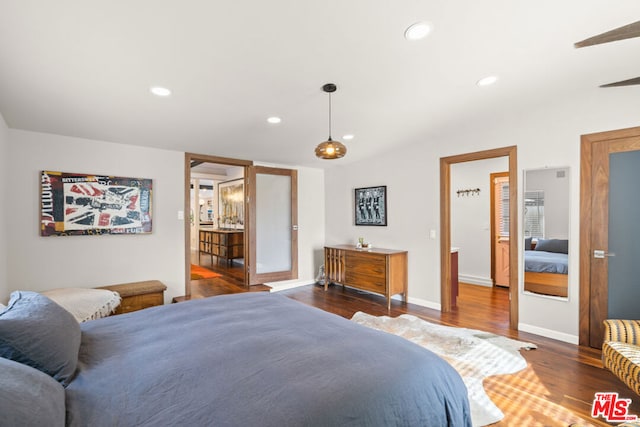 bedroom featuring dark wood-type flooring