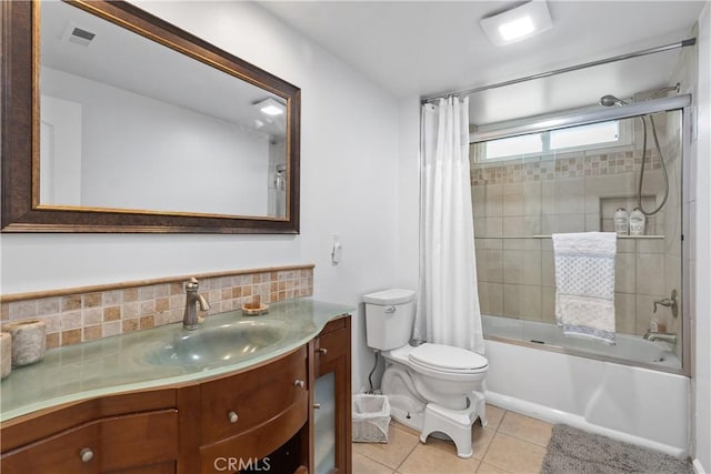 full bathroom featuring tile patterned floors, vanity, decorative backsplash, toilet, and shower / tub combo with curtain