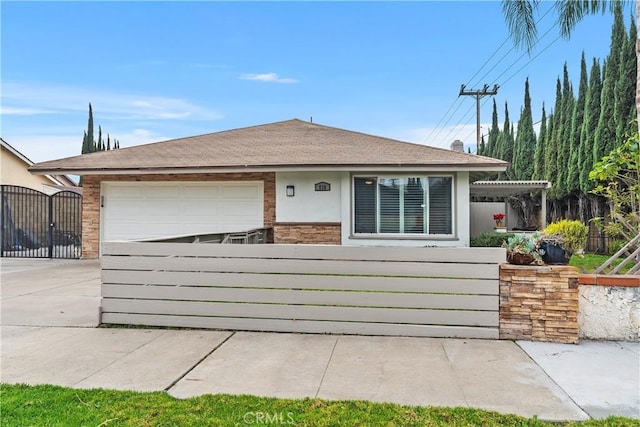 view of front of property featuring a garage