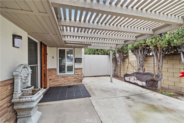 view of patio / terrace featuring a pergola