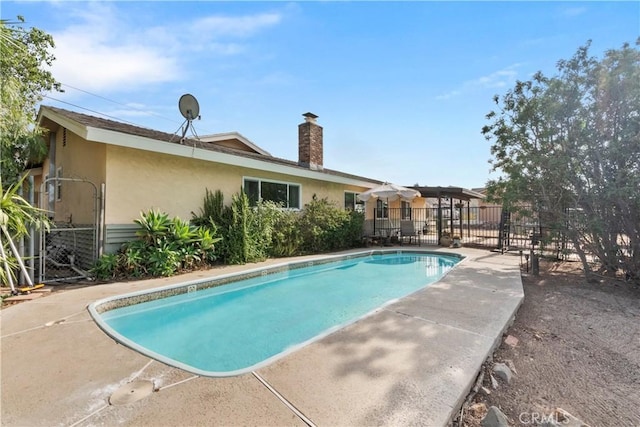 view of pool featuring a fenced in pool, fence, and a patio