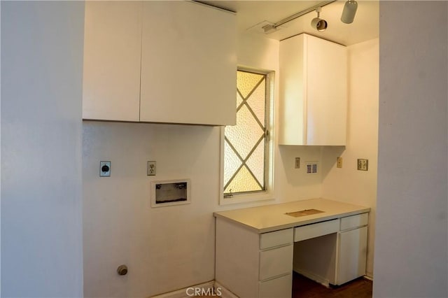 clothes washing area with cabinets, washer hookup, and electric dryer hookup