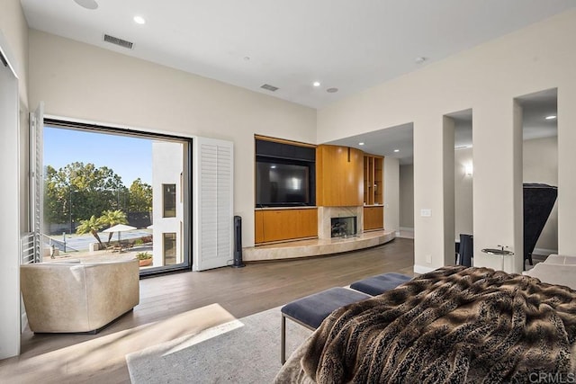 bedroom with hardwood / wood-style floors