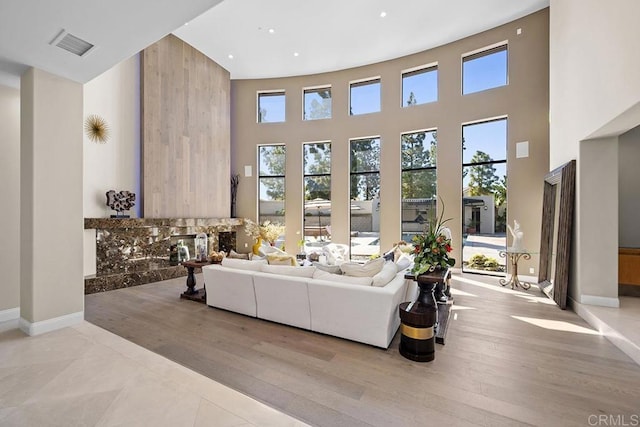 living room featuring a high ceiling