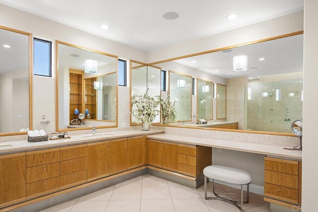 1107 Majestad Ln, Chula Vista, CA 91910 - full bath featuring tile patterned floors, plenty of natural light, double vanity, and a sink