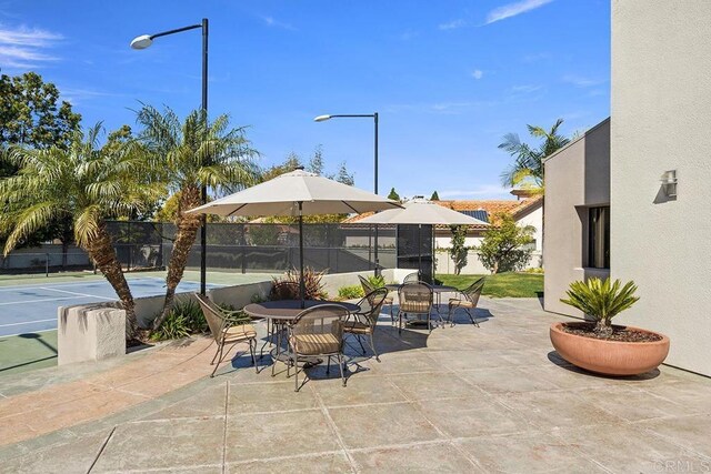 1107 Majestad Ln, Chula Vista, CA 91910 - view of patio with fence and outdoor dining area