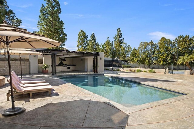 1107 Majestad Ln, Chula Vista, CA 91910 - view of pool with a patio, fence, a fenced in pool, and a pergola