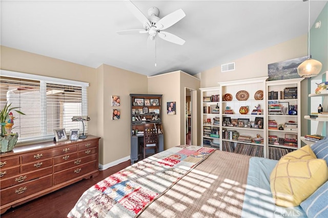 bedroom featuring ceiling fan and dark hardwood / wood-style floors