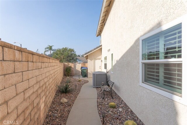 view of side of property featuring cooling unit