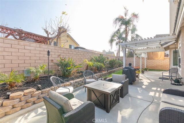 view of patio / terrace with an outdoor living space, a pergola, and area for grilling