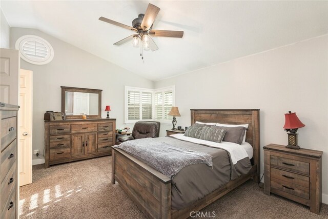 bedroom featuring ceiling fan, light carpet, and lofted ceiling