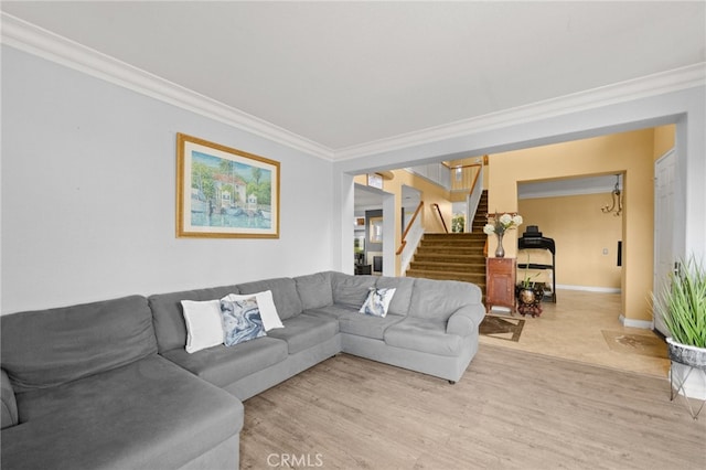 living room featuring wood-type flooring and crown molding